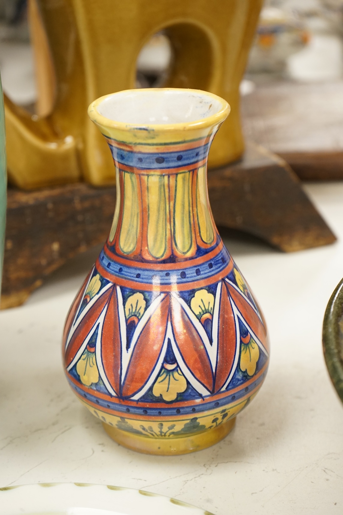A collection of ceramics to include a Poole turquoise vase, modernist elephant and Santo Stefano di Camastra vase, largest 37cm high